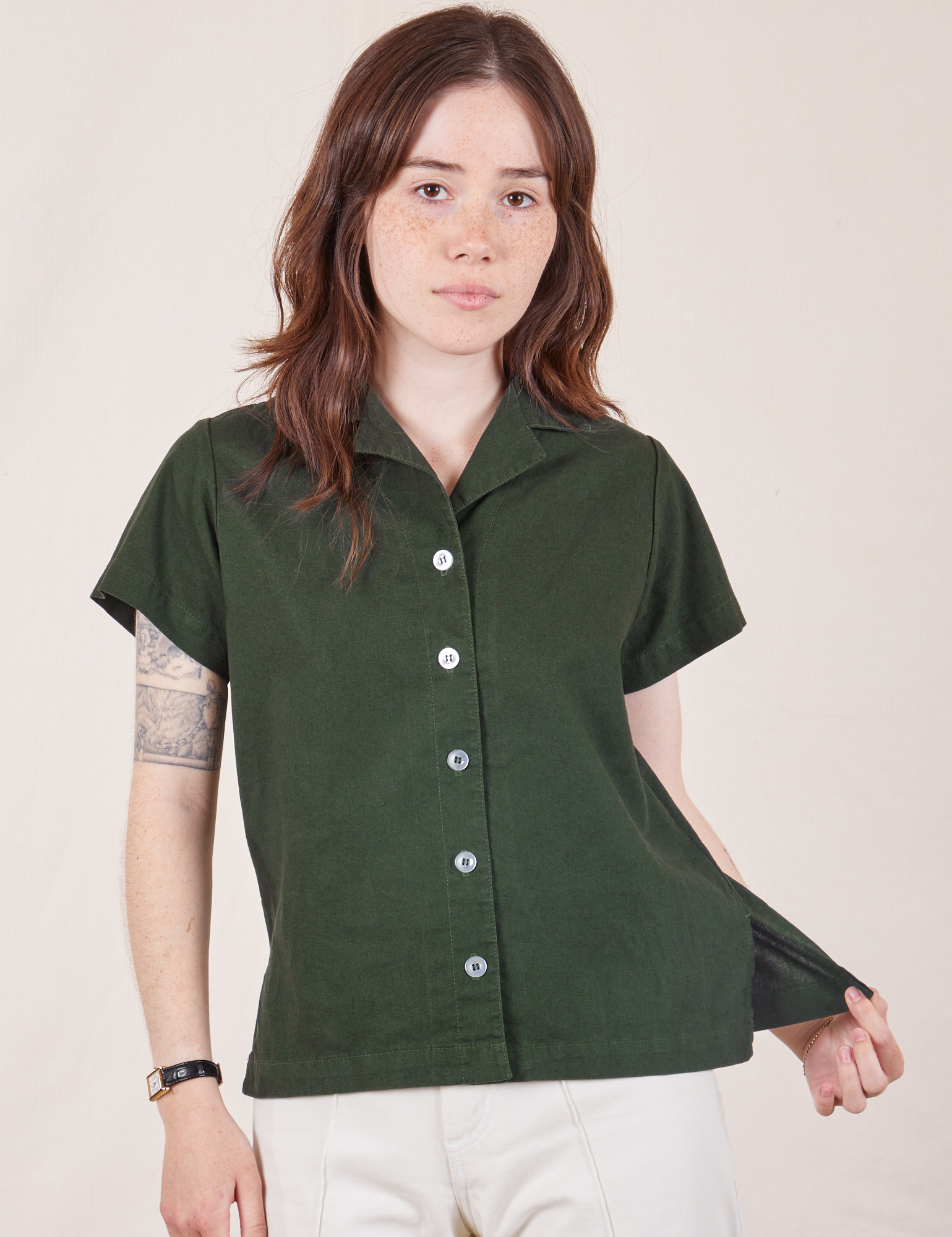 Hana is wearing Pantry Button-Up in Swamp Green