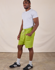 Sweat Shorts in Gross Green side view on Isaac