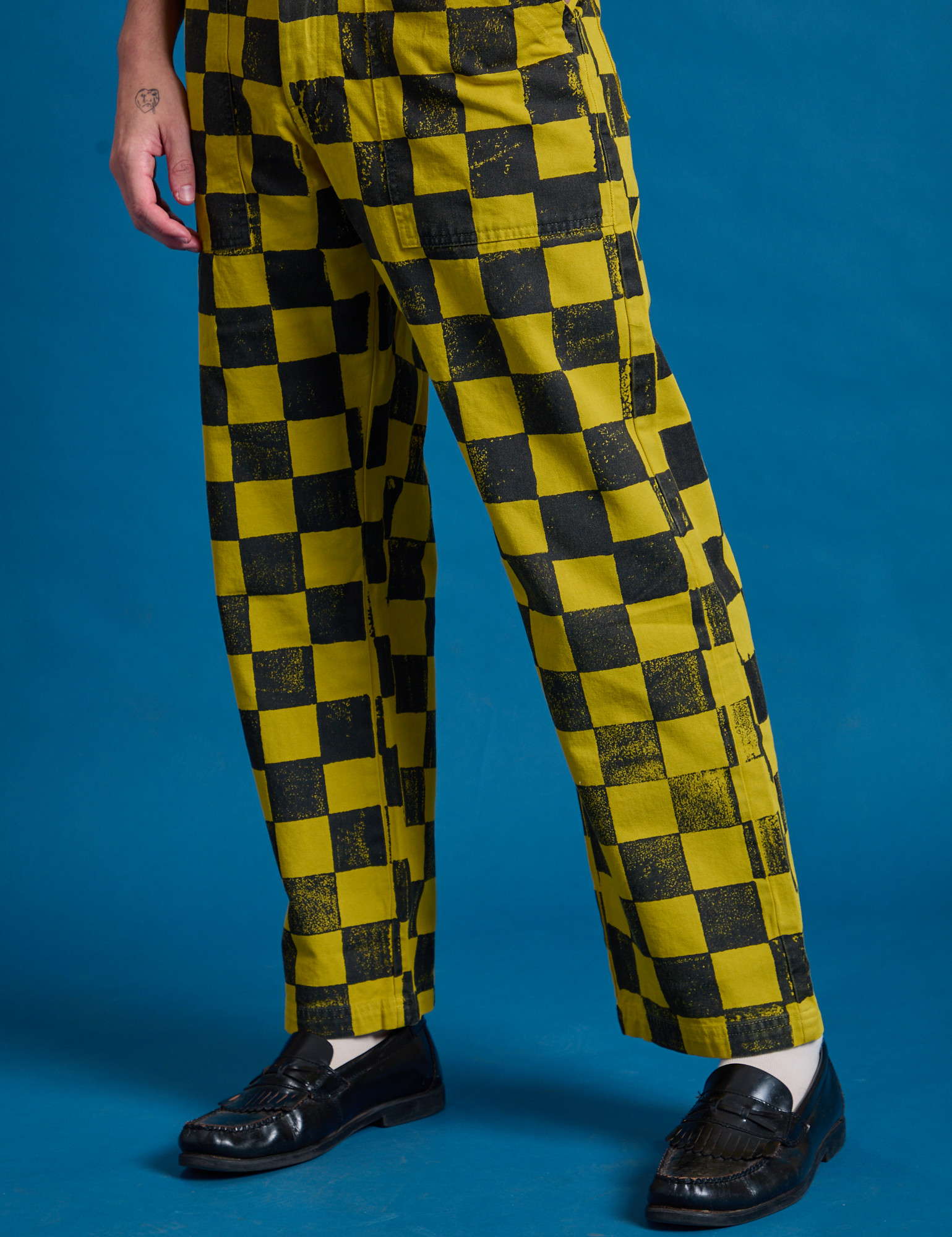 Checkerboard Work Pants in Yellow/Black angled front view on Quinn