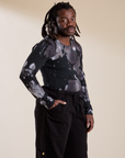 Angled front view of Long Sleeve Baby Tee in Ink Blot on Demi