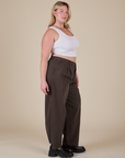 Side view of Heavyweight Trousers in Espresso Brown and vintage tee white Cropped Tank