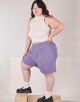 Side view of Trouser Shorts in Faded Grape and Sleeveless Turtleneck on Ashley