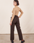 Work Pants in Espresso Brown back view on Soraya wearing tan Essential Turtleneck