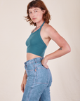 Side view of Halter Top in Marine Blue and light wash Frontier Jeans worn by Alex
