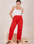 Tiara is 5'4" and wearing S Heavyweight Trousers in Mustang Red paired with Cropped Cami in vintage tee off-white