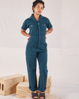 Mika is wearing Heritage Short Sleeve Jumpsuit in Lagoon