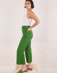 Side view of Heritage Westerns in Lawn Green and vintage off-white Tank Top on Soraya