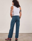 Back view of Work Pants in Lagoon and vintage tee off-white Cropped Tank