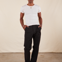 Jerrod is 6'3" and wearing Long S Work Pants in Basic Black
