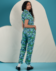Angled back view of Angel Print Jumpsuit on Shahana