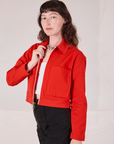 Mechanic Jacket in Mustang Red angled front view on Alex