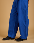 Pant leg side view close up of Baggy Mid-Rise Trousers in Royal Blue on Jerrod