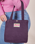Nebula Purple Shopper Tote worn on model's arm