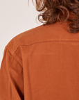 Back shoulder close up of Oversize Overshirt in Burnt Terracotta on Alex