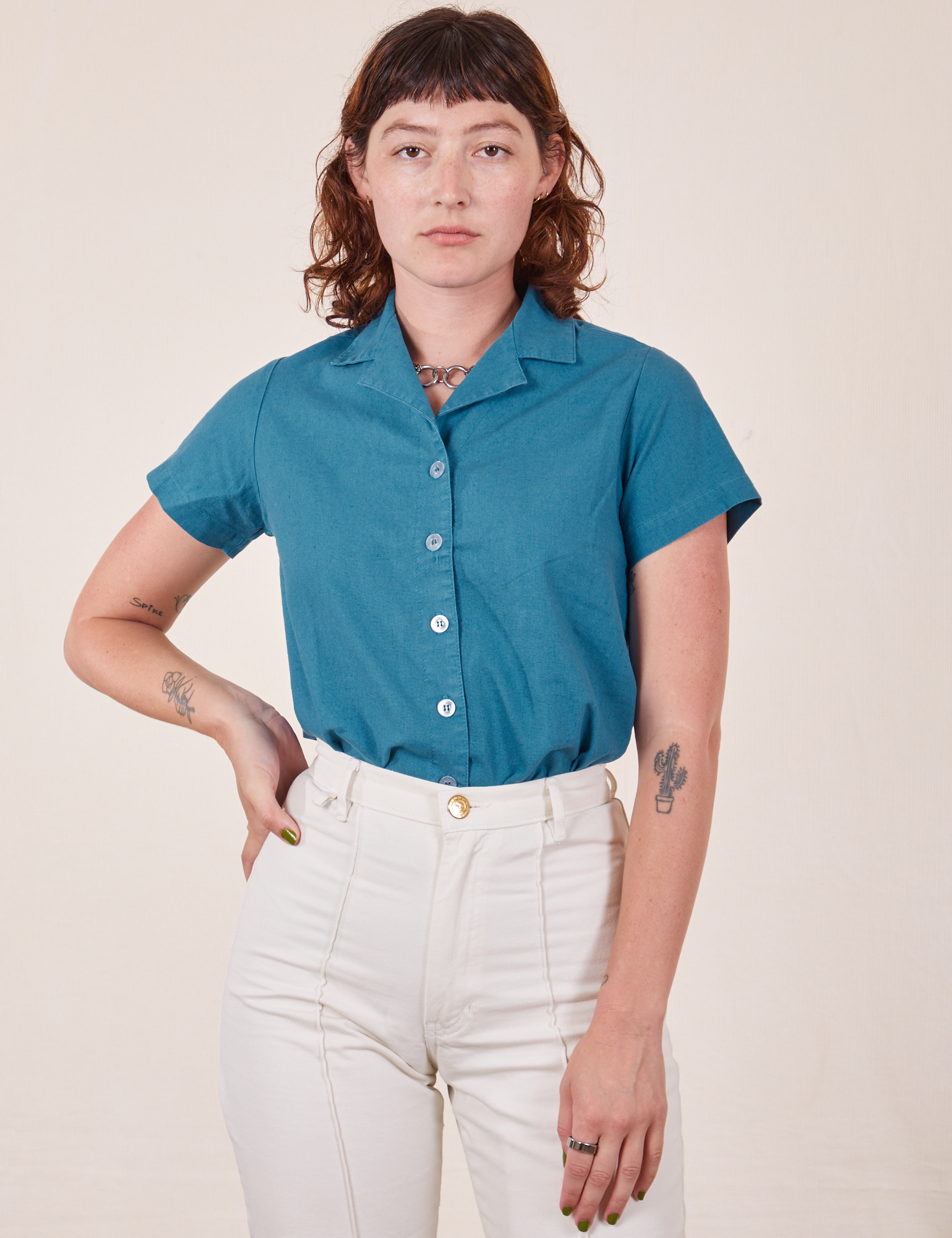 Alex is wearing Pantry Button-Up in Marine Blue