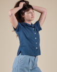 Angled front view of Pantry Button-Up in French Blue on Alex