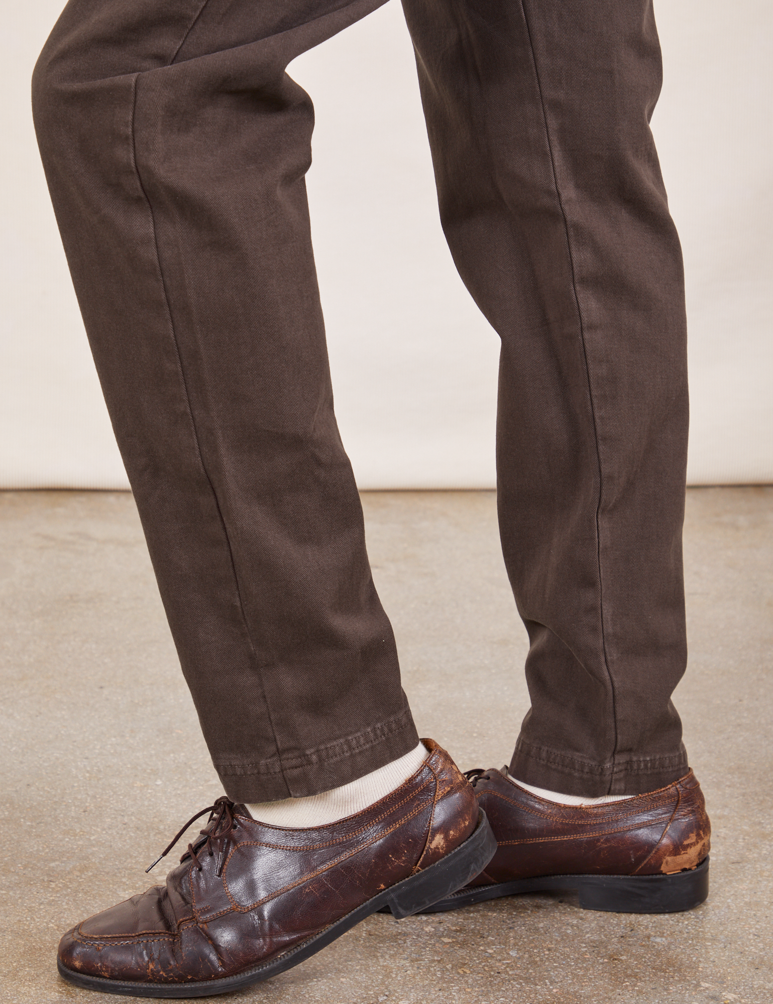 Pencil Pants in Espresso Brown pant leg side view on Jesse