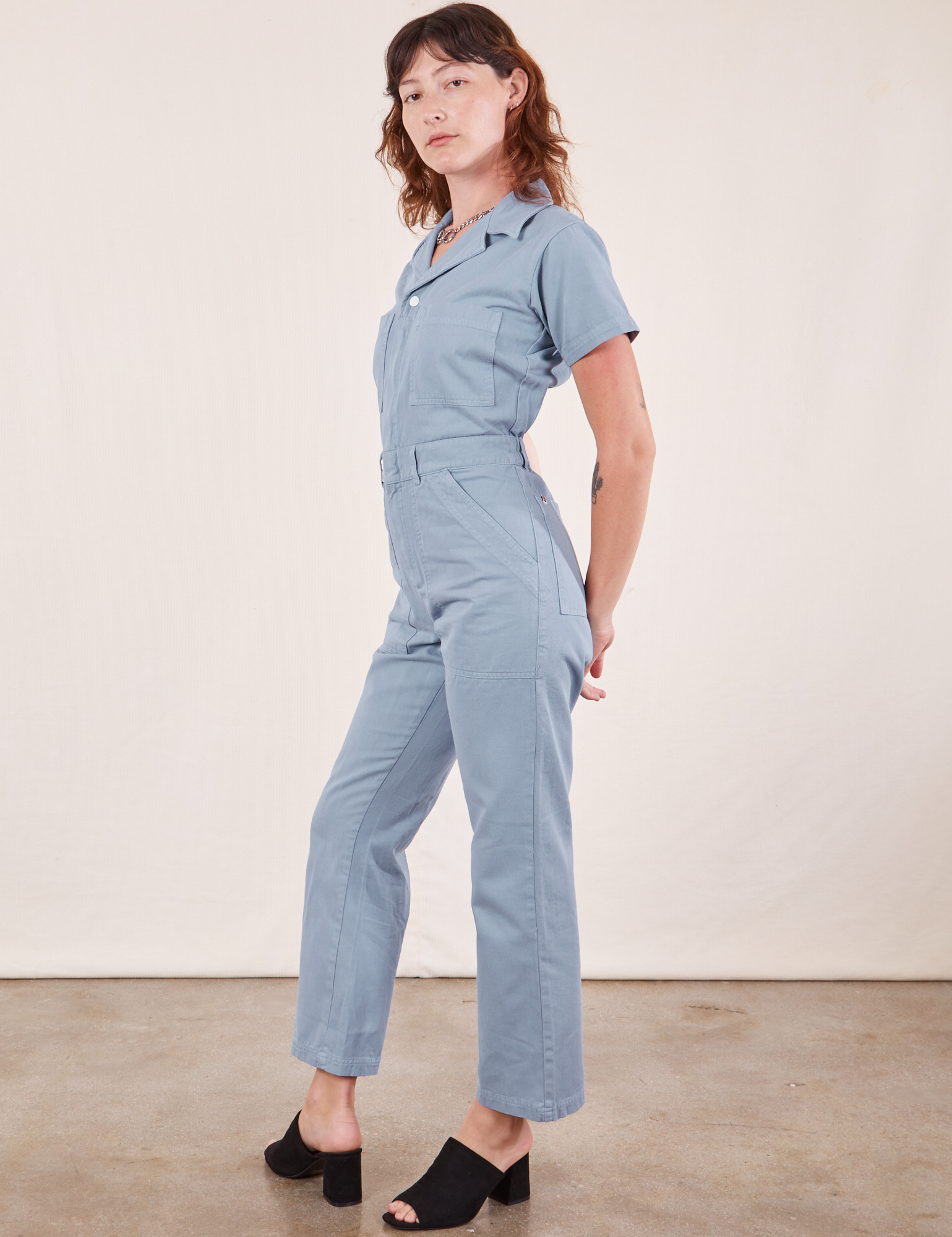 Side view of Short Sleeve Jumpsuit in Periwinkle on Alex