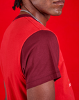 Vintage Tee in Cherry Soda side close up of red wine contrast sleeve on Jerrod