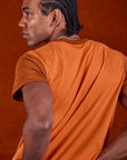 Vintage Tee in Orange Soda back view on Jerrod