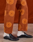 Paintstamped Work Pants in Orange side view on Jerrod