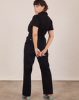 Back view of Short Sleeve Jumpsuit in Basic Black worn by Tiara