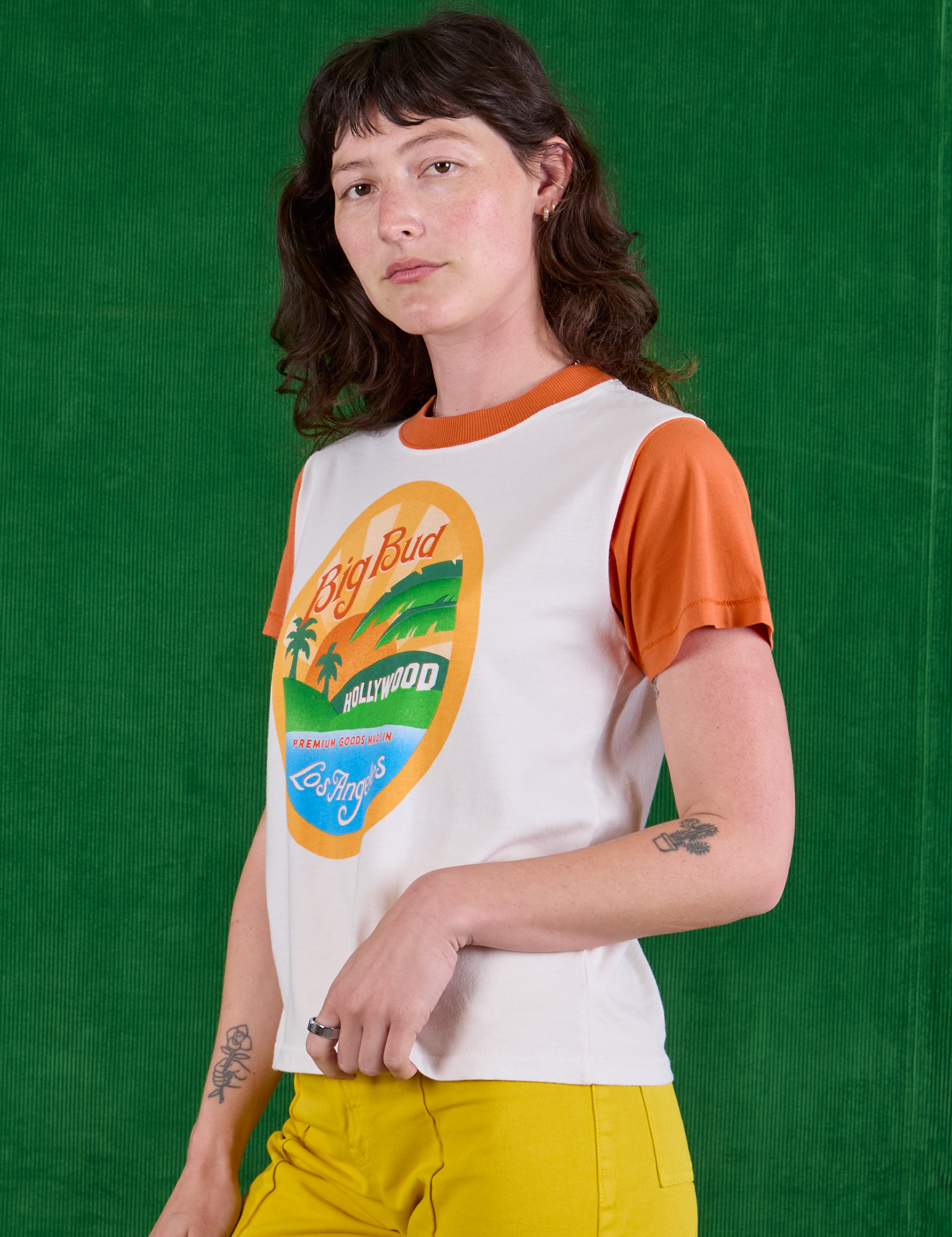 Hollywood Tourist Tee angled front view on Alex