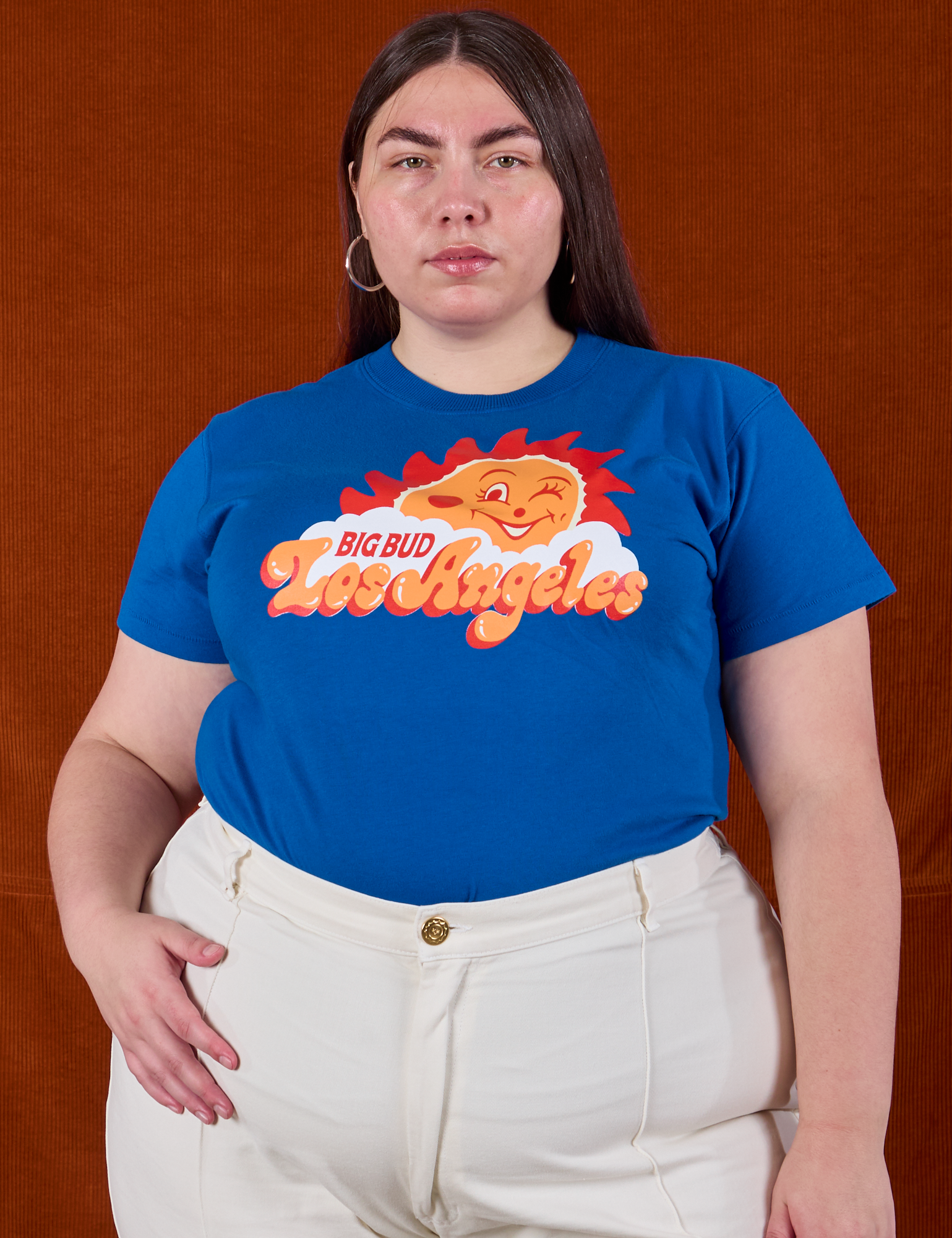Marielena is wearing Sunny Los Angeles Tourist Tee tucked into vintage tee off-white Western Pants