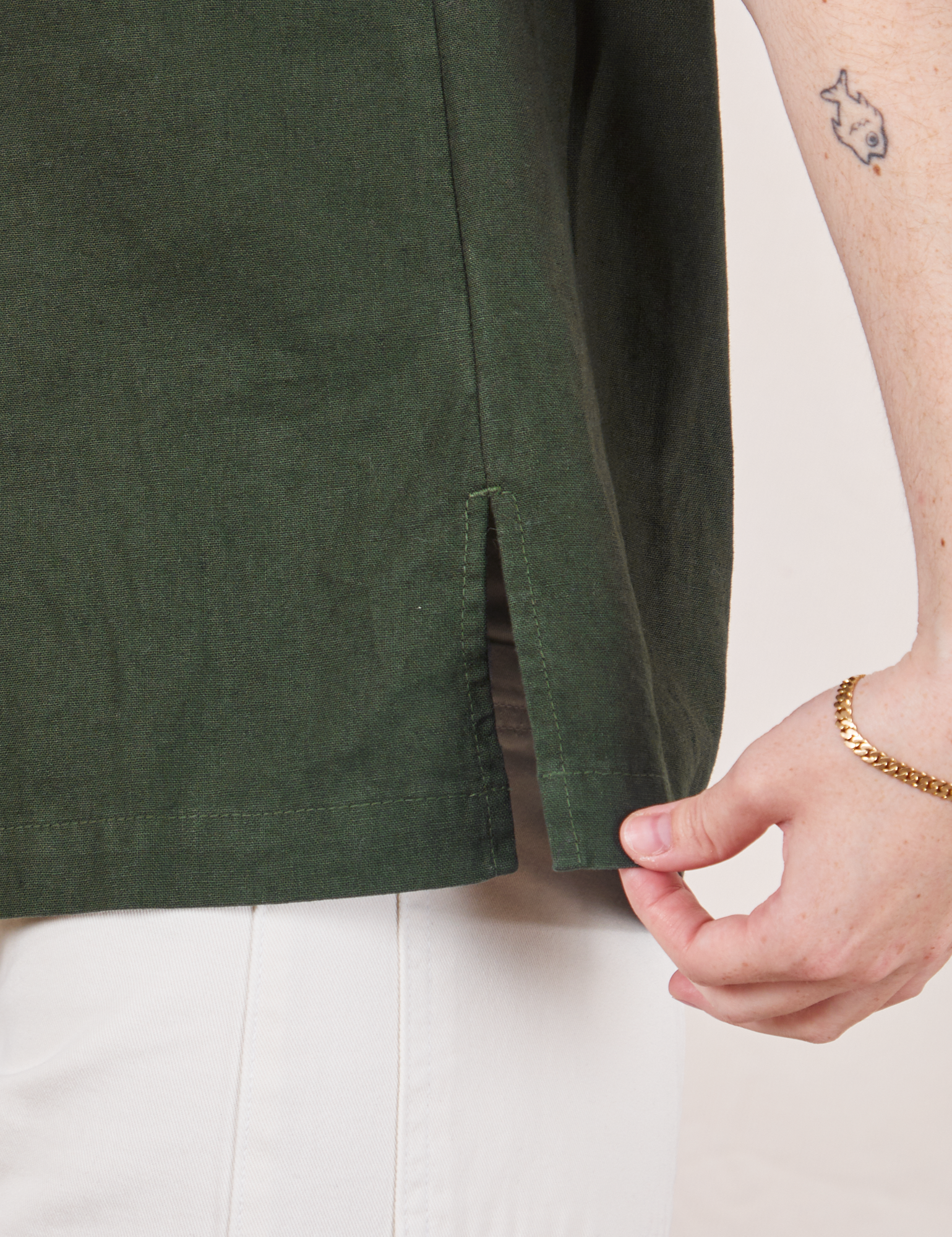 Pantry Button-Up in Swamp Green side vent close up on Hana
