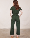 Petite Short Sleeve Jumpsuit in Swamp Green back view on Hana