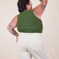 Tank Top in Dark Emerald Green back view on Sam wearing vintage off-white Western Pants