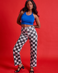 Kandia is wearing Checkerboard Work Pants in Black/White and royal blue Halter Top