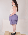 Angled back view of Trouser Shorts in Faded Grape on Ashley