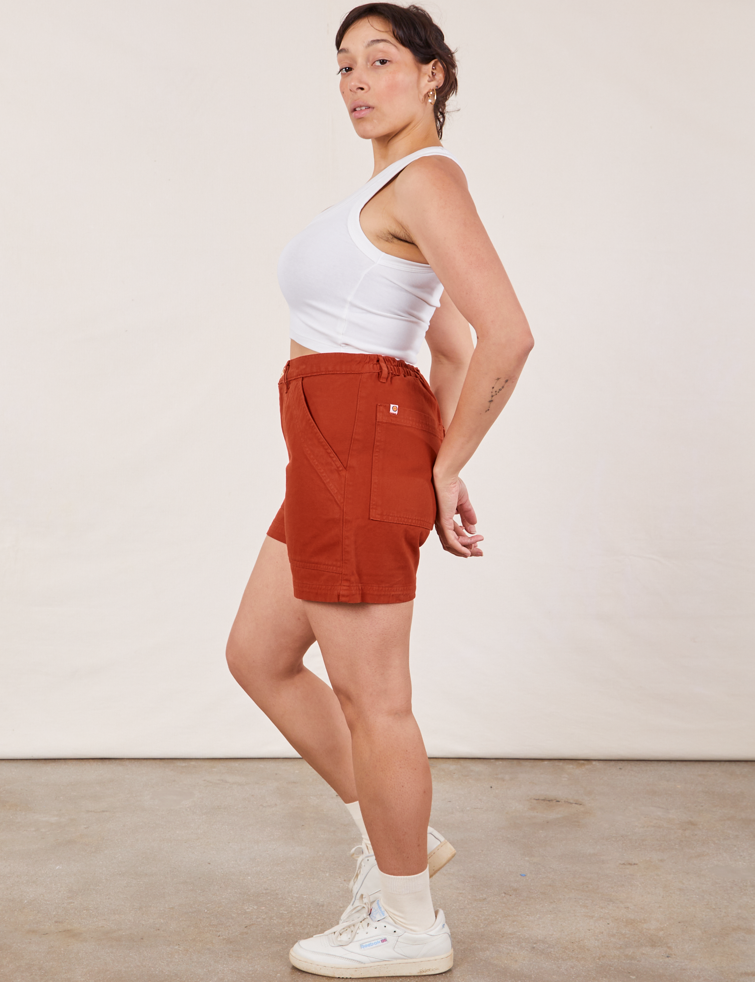 Side view of Classic Work Shorts in Paprika and Cropped Tank Top in vintage tee off-white on Tiara