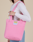 Over-Shoulder Zip Mini Tote in Bubblegum worn over shoulder of model