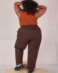 Back view of Overdyed Denim Trouser in Fudge and burnt terracotta Cropped Tank