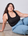 Ashley is wearing Cropped Tank Top in Basic Black