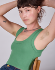 Cropped Tank Top in Seafoam Green angled front view on Alex
