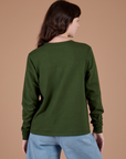 Long Sleeve Burly Tee in Evergreen back view on Alex