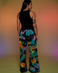 Back view of Tie Dyed Wide Leg Sweat Pants and black Tank Top on Anthony