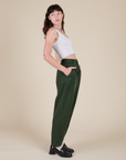 Side view of Heavyweight Trousers in Swamp Green and Cropped Tank in vintage tee white