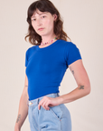 Baby Tee in Royal Blue angled front view on Alex