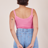 Back view of Cropped Cami in Bubblegum Pink and light wash Sailor Jeans worn by Tiara