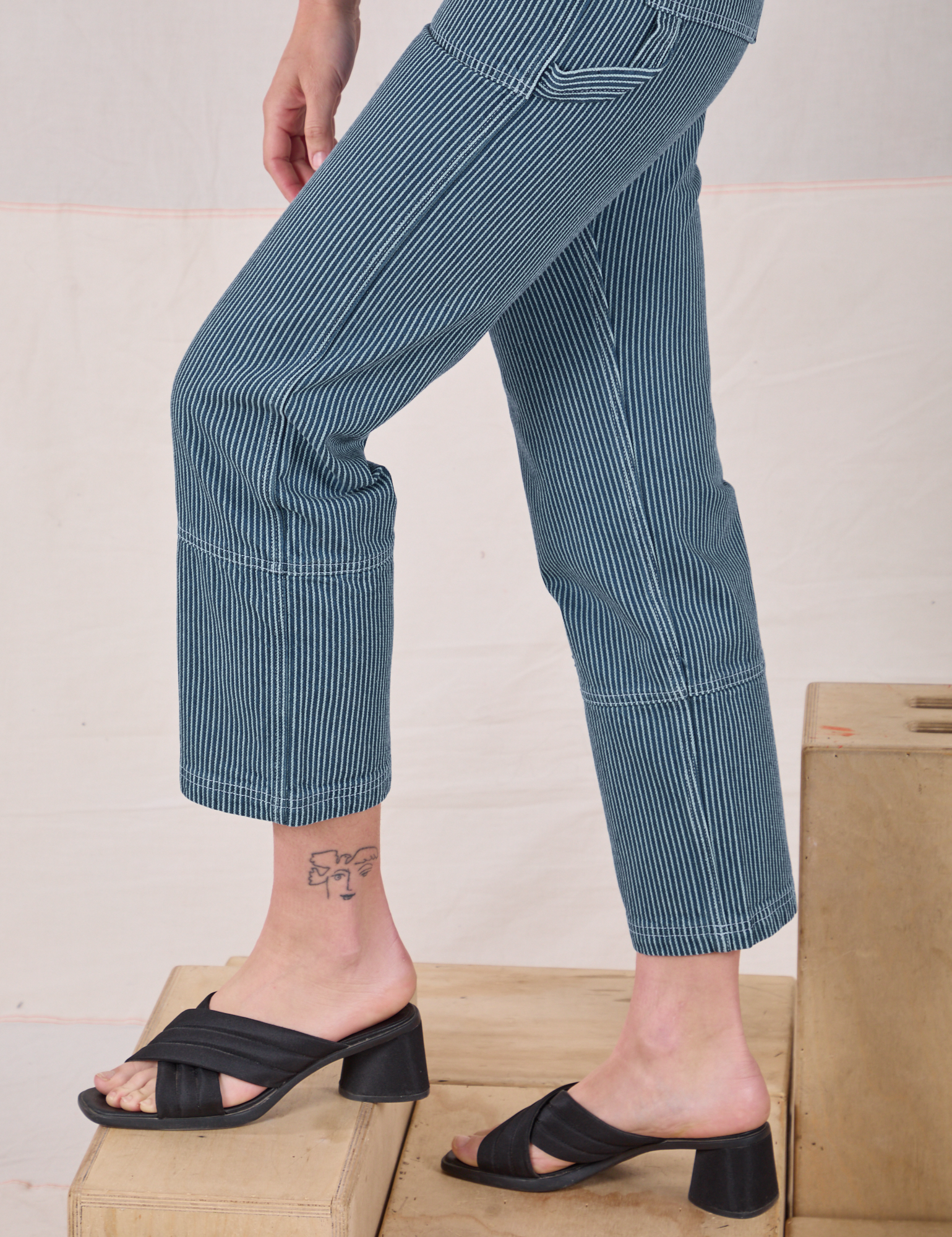 Railroad Carpenter Jeans in Baby Blue side leg close up on Alex