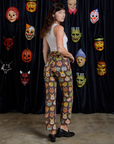 Work Pants in Halloween Masks back view on Alex