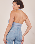 Back view of Halter Top in Periwinkle and light wash Sailor Jeans worn by Tiara