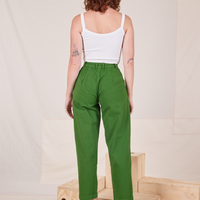 Back view of Heavyweight Trousers in Lawn Green and vintage off-white Cropped Cami worn by Alex