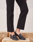 Heritage Short Sleeve Jumpsuit in Basic Black pant leg close up on Alex