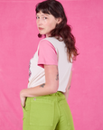 Angled back view of Anniversary Tee in Pink Poppy on Alex