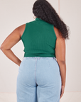 Back view of Sleeveless Essential Turtleneck in Hunter Green worn by Meghna